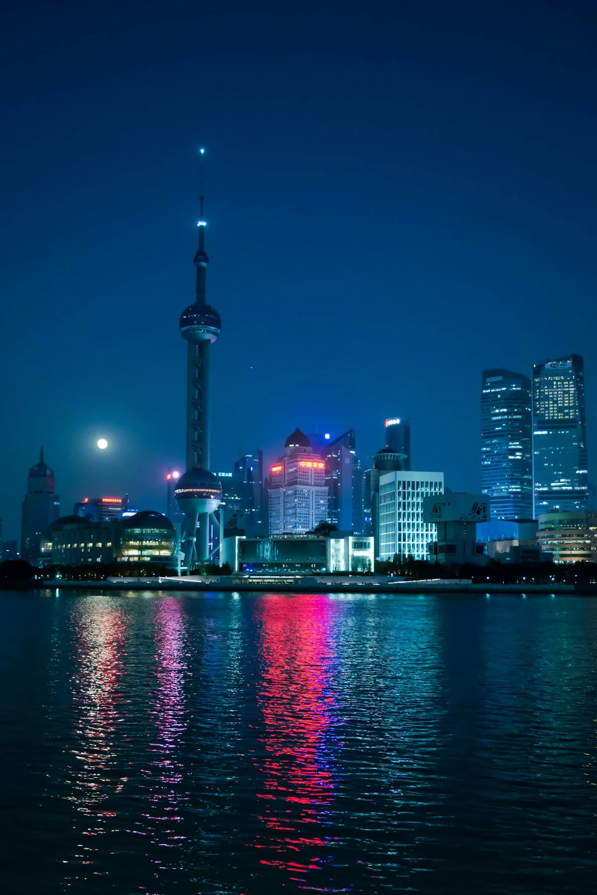 The Bund waterfront at night with Pudong skyline