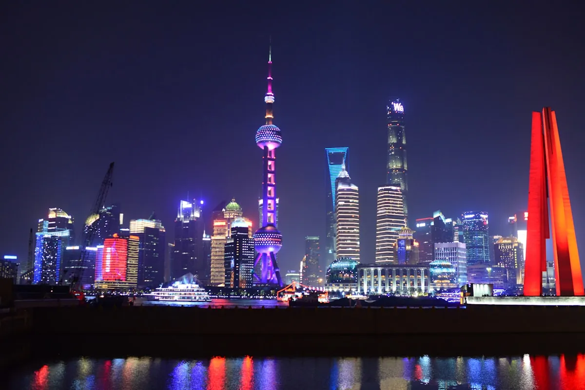 A well-lit pedestrian street in Shanghai at night